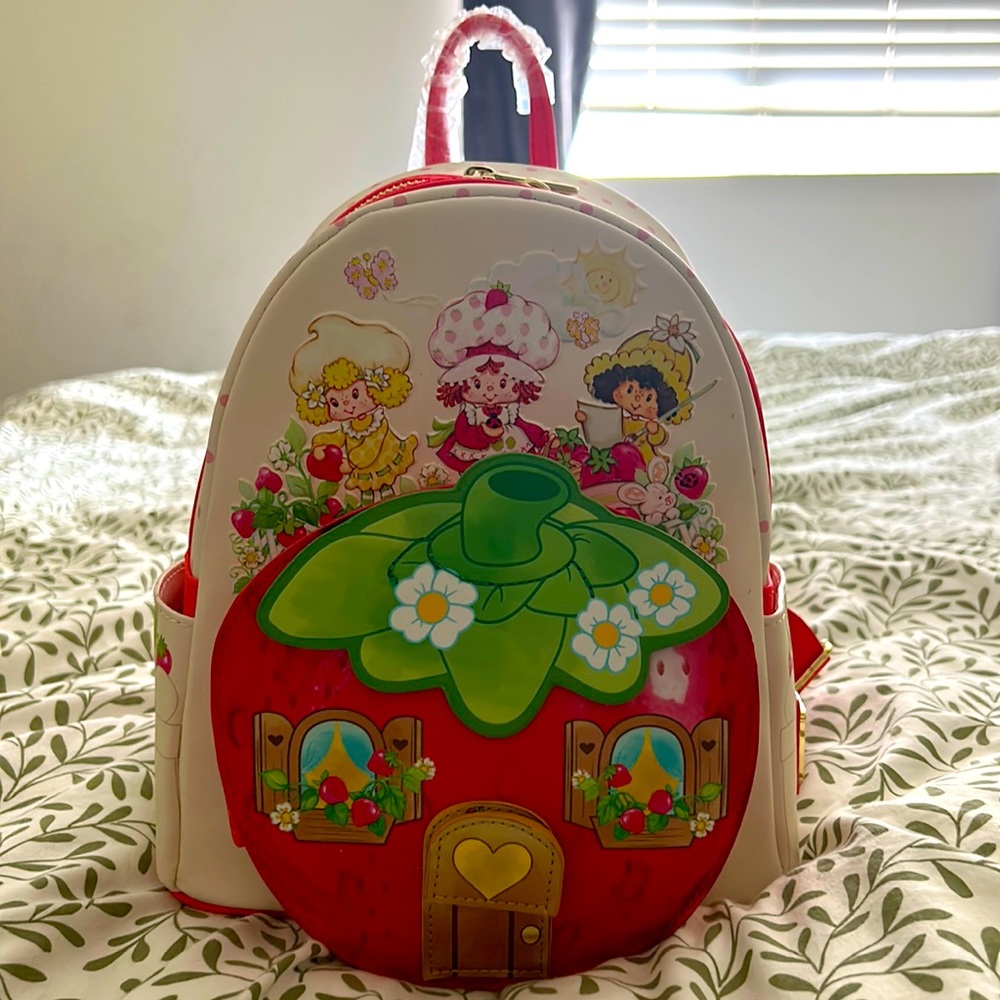 Loungefly Strawberry shortcake backpack and wallet!! Brand new never used.